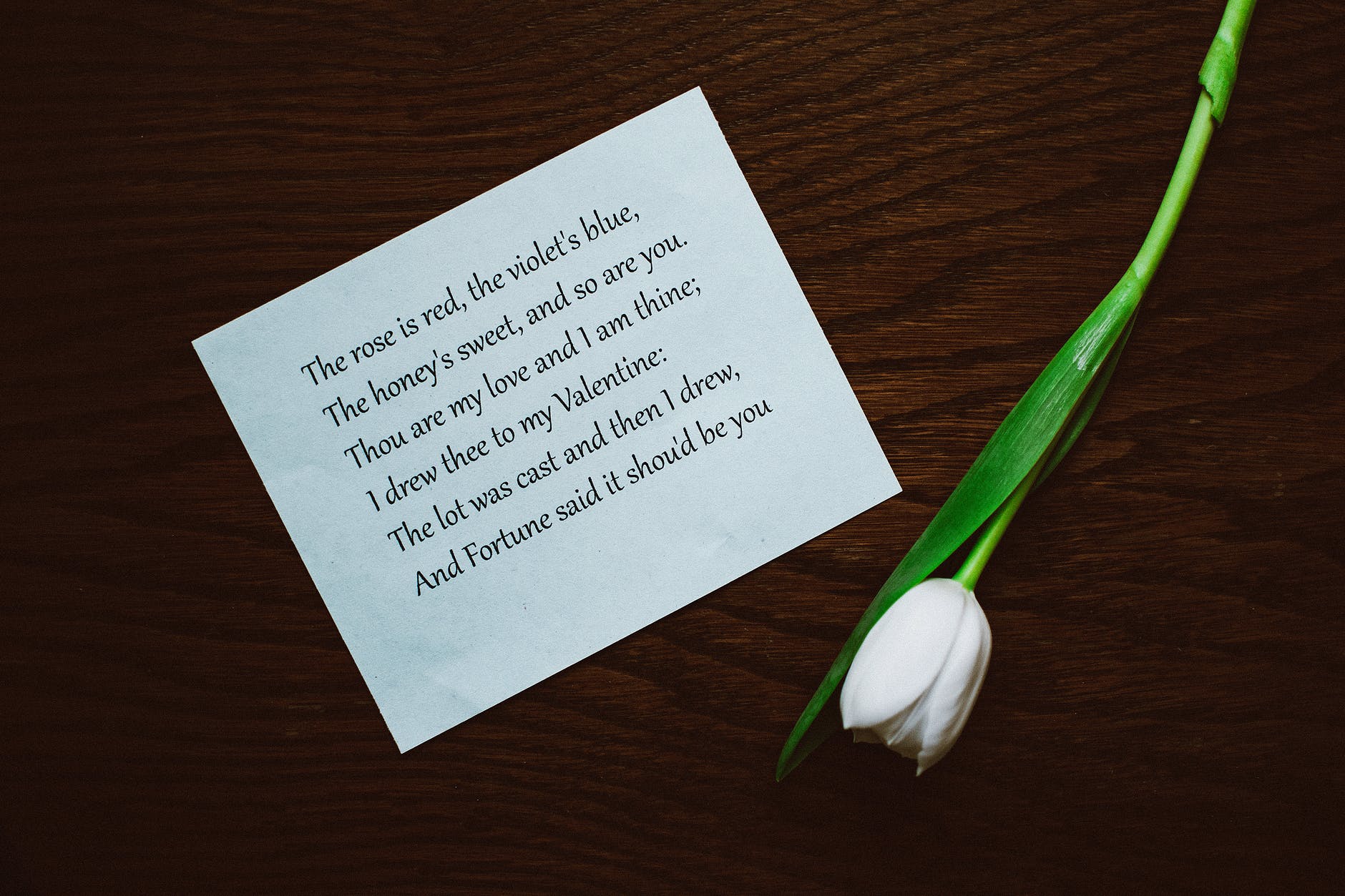 white paper on brown wooden table